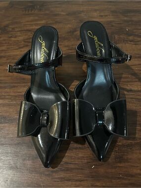 Jellypop Black Patent Pointed-Toe Slingback Mules with Bow